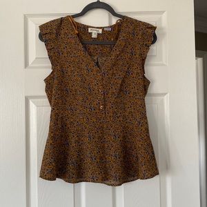 Brownish orange floral sleeveless top